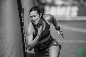 Female athlete runs the agility course at the CrossFit Games.