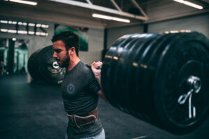 Coach Hunter backsquatting all the weight