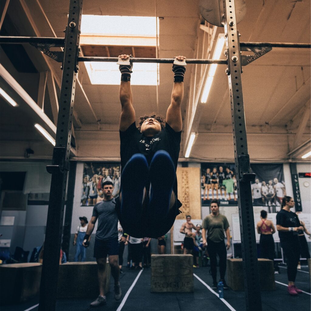 Invictus Athlete doing his first bar muscle-up because he followed the bar muscle-up program