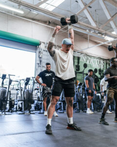 Joshua Al-Chamaa doing a dumbbell snatch