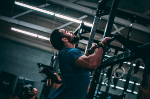 Invictus athlete doing a butterfly pull up because he was properly cued how to do them.