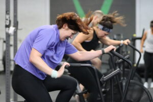 A CrossFit Invictus athlete on the echo bike.