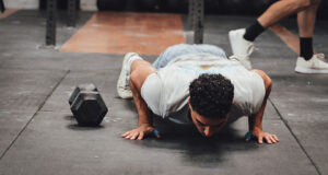 Burpee over the Dumbbell